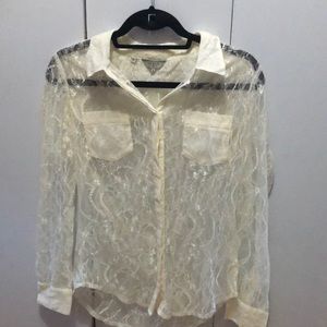 Guess button up top